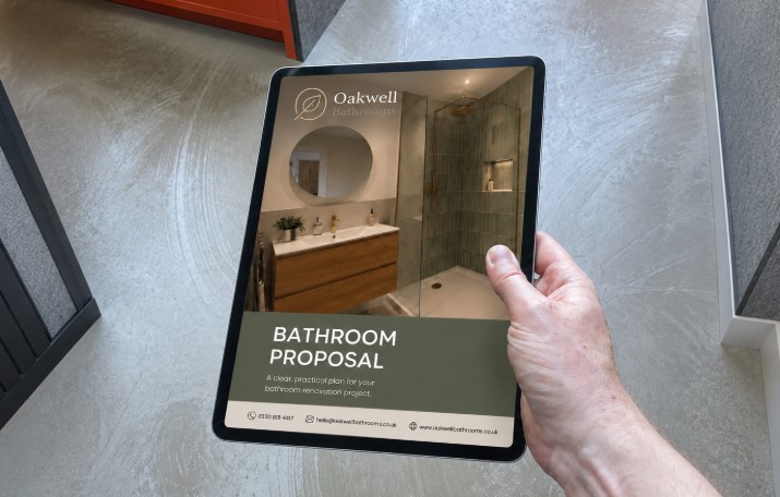 Customer reviewing the bathroom proposal on a tablet